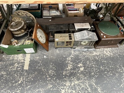 Lot 1757 - A collection of clocks and their parts,...