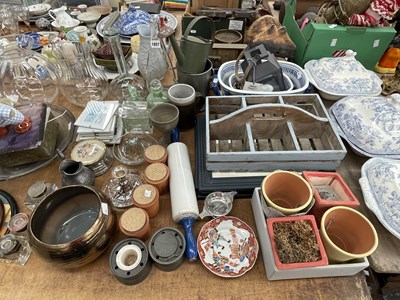 Lot 1807 - A garden pot carrier, garden pots, a silver...