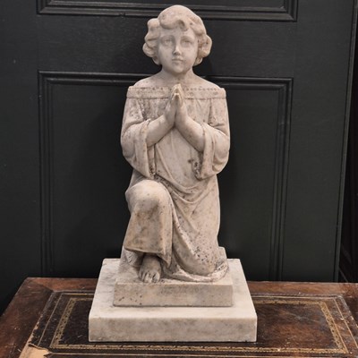 Lot 467a - An antique carved marble figure of a praying...