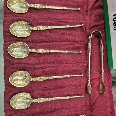 Lot 1065 - A set of twelve hallmarked silver spoons of...