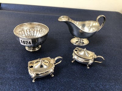 Lot 1074 - Hallmarked silver to include a sauce boat, a...
