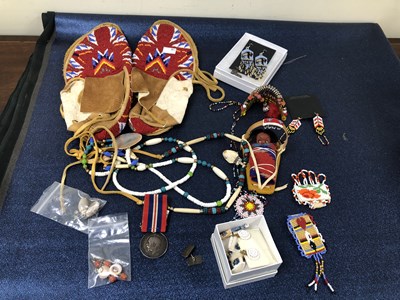 Lot 1169 - Native American beadwork mocassins, various...