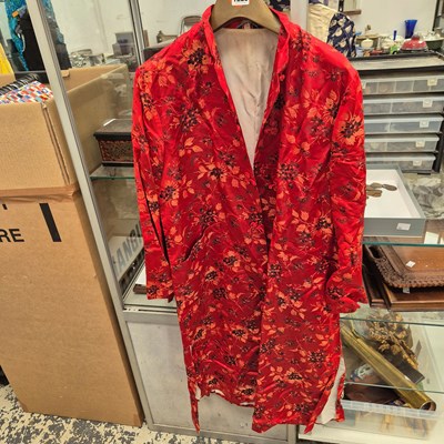 Lot 1229 - A Japanese traditional red silk embroidered...
