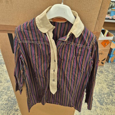 Lot 1232 - A selection of vintage clothing from the...