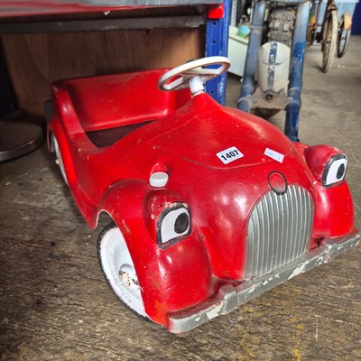 Lot 1407 - A Vintage Tri-Ang "Chubby" plastic pedal car.