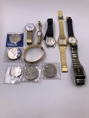 Lot 1039 - Watches, coins and a 9ct gold and metal core...