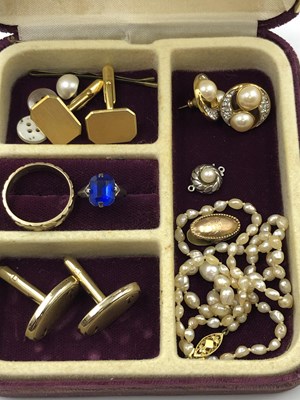 Lot 1010 - A row of graduated pearls with a 9ct...