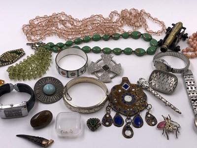 Lot 1042 - A silver Edwardian paste set pendant and later...