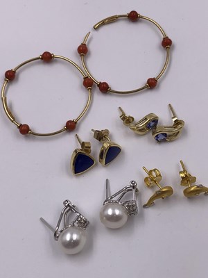 Lot 1007 - Earrings. A pair of 18ct hallmarked gold stud...