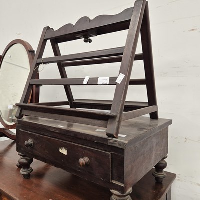 Lot 2209 - An antique reading stand together with a low...