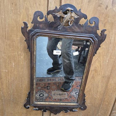 Lot 2220 - A 19th-century fret framed small wall mirror.