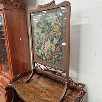 Lot 2222 - An early 20th century mahogany firescreen with...