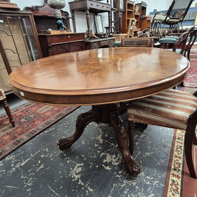 Lot 2230 - A Victorian walnut breakfast table with an...