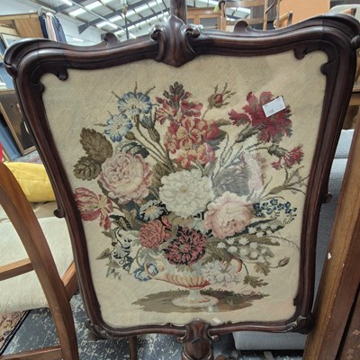 Lot 2237 - A Victorian mahogany pole screen, the...