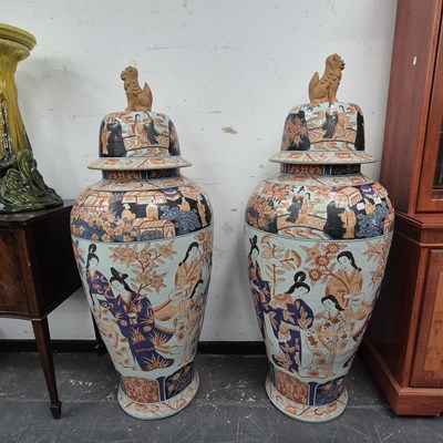 Lot 2247 - A pair of monumental Imari decorated lidded...