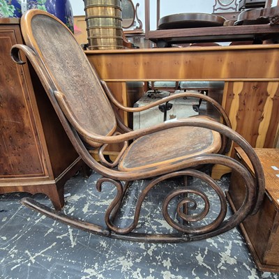Lot 2250 - An antique bentwood rocking chair, probably by...