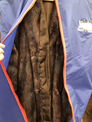 Lot 1878 - A long mink fur coat and a leather vintage...