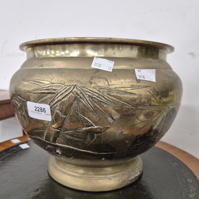 Lot 2286 - An oriental bronze jardinaiere.