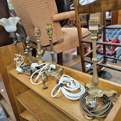 Lot 2302 - Five brass table lamps.