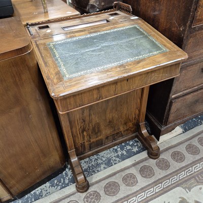 Lot 2305 - A Victorian walnut Davenport desk.