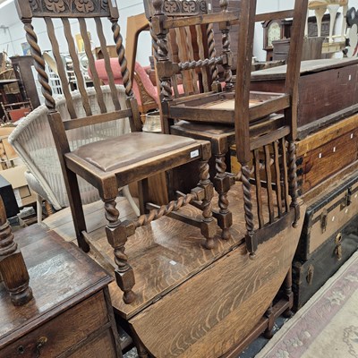Lot 2308 - An oak gate leg table and three chairs...