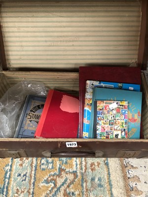 Lot 1973 - A suitcase containing stamp albums