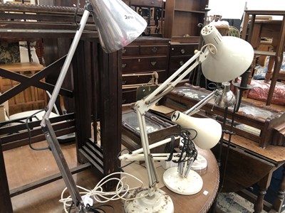 Lot 2011 - Four angle poise lamps together with a copper...