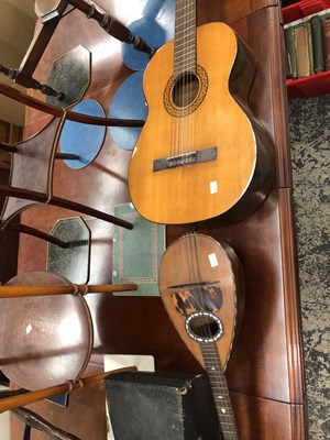 Lot 2013 - A Musicima guitar together with a cased mandolin