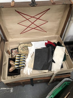 Lot 2014 - A trunk containing hand bags, lady's gloves...