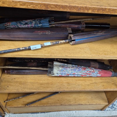 Lot 2316 - A quantity of oriental parasols.