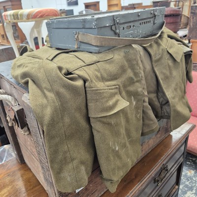 Lot 2319 - A vintage military uniform, a pine trunk, and...