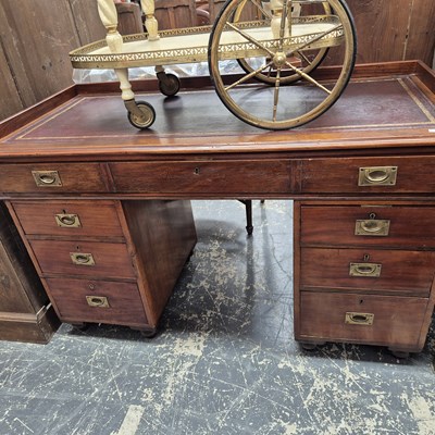Lot 2323 - A campaign-style twin pedestal desk. H 76 W...