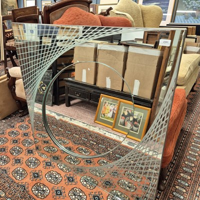 Lot 2351 - A large modern wall mirror.