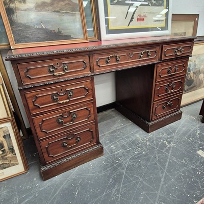 Lot 2367 - A 19th-century mahogany twin pedestal desk. H...