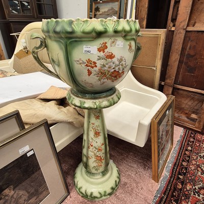 Lot 2382 - A pottery planter on a stand.