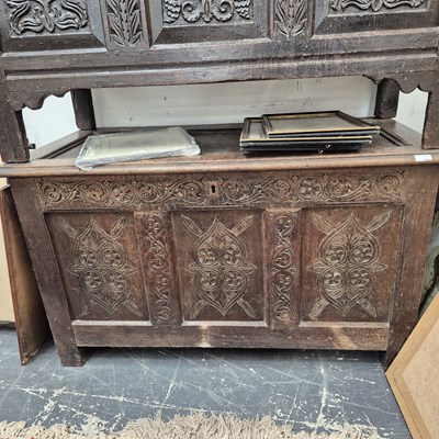 Lot 2391 - Early 18th-century oak panel front coffer.