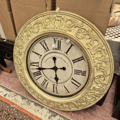 Lot 2401 - A decorative wall clock.