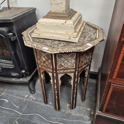 Lot 2414 - A Moorish octagonal occasional table and a...