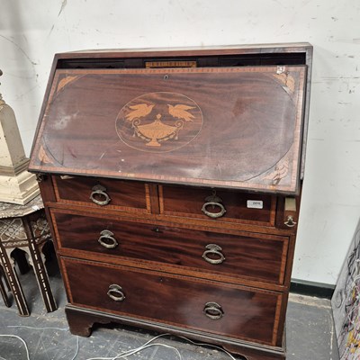 Lot 2416 - A 19th-century mahogany bureau.