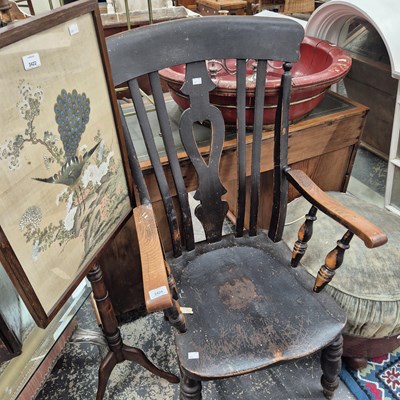 Lot 2424 - A Victorian slat-back kitchen armchair.
