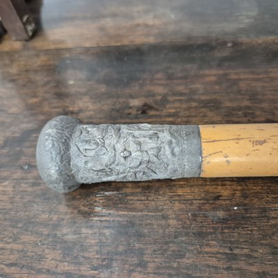 Lot 2440 - A Mallaca walking cane with a white metal...