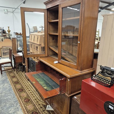 Lot 2464 - A Victorian oak secretaire bookcase.