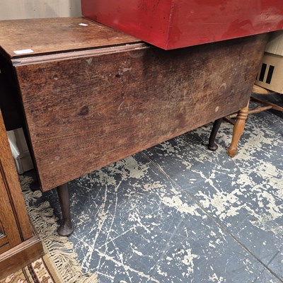 Lot 2468 - A mahogany gate-leg dining table. (extended) H...