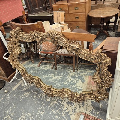 Lot 2492 - A large gilt-framed mirror. 106 x 153cm