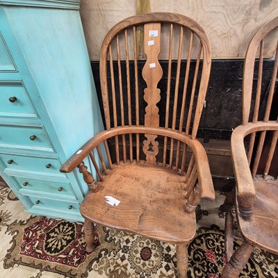 Lot 2497 - An antique Windsor armchair.