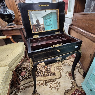 Lot 2513 - A 19th-century French ebonised and gilt brass...