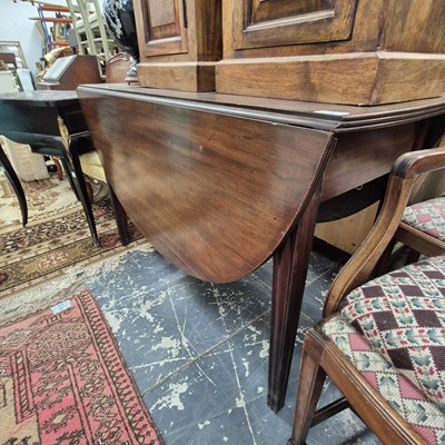 Lot 2516 - A 19th-century mahogany dining table.