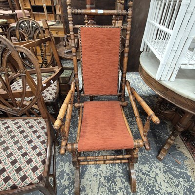 Lot 2518 - A Victorian aesthetic rocking chair.