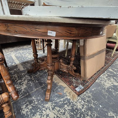 Lot 2520 - A Victorian walnut and marble-topped centre...