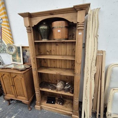 Lot 2530 - A tall pine bookcase.